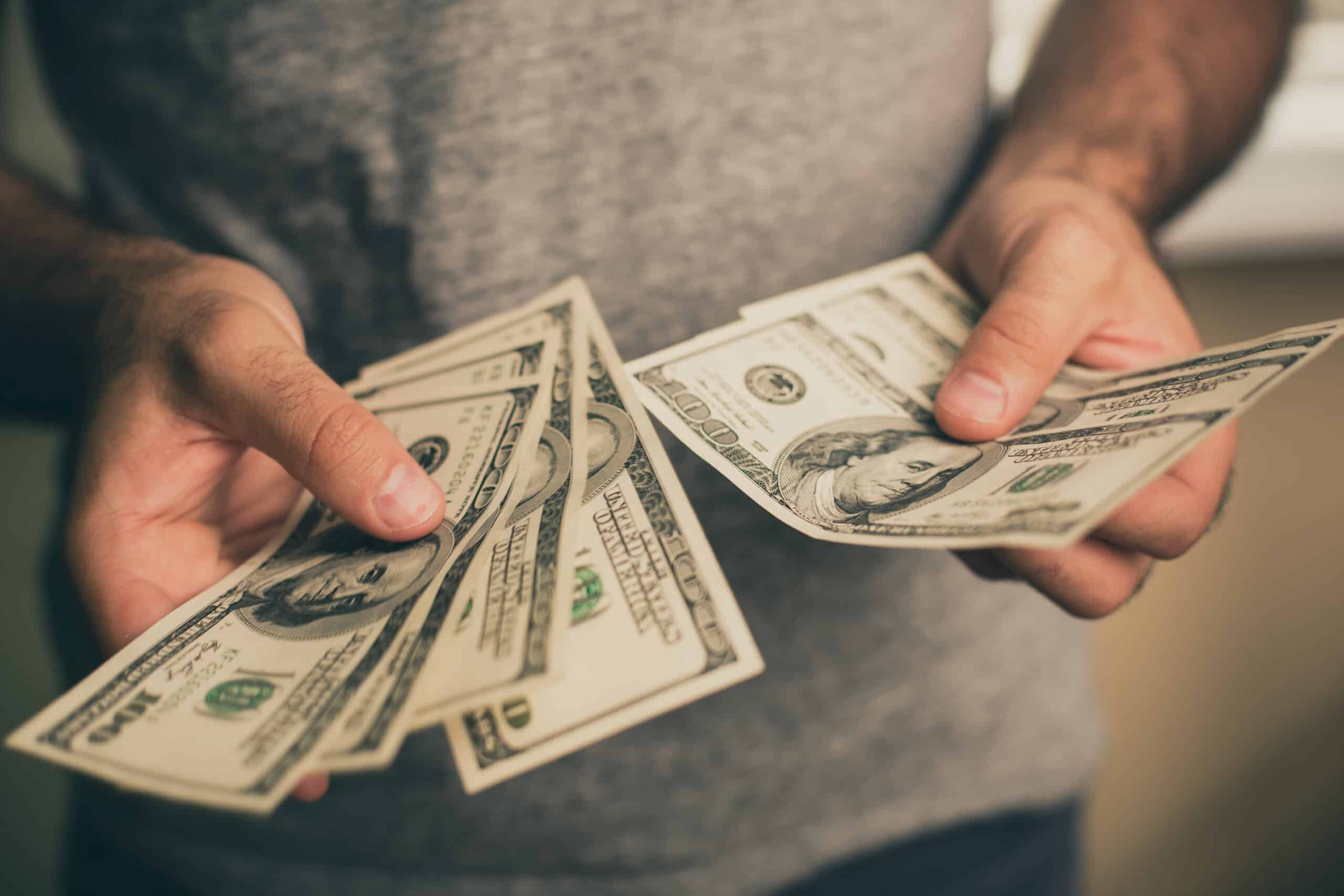 Man with cash in his hands